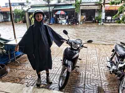 Evie ready to go out in the flooded streets with her poncho!