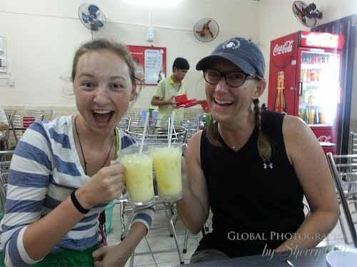 Evie and I enjoying our corn milk. Cornhuskers at heart!