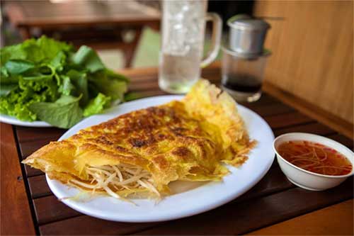 Bánh xèo, a Vietnamese classic © Adam Young / Getty sites/default/files